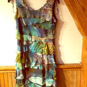 Sleeveless multi color dress with side zipper.